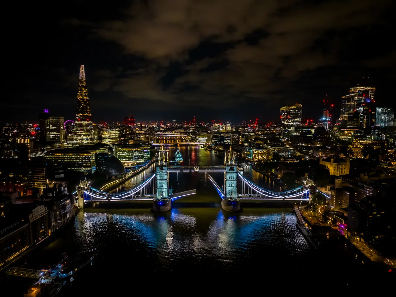 Tower Bridge and the Thames viewed from the air at night