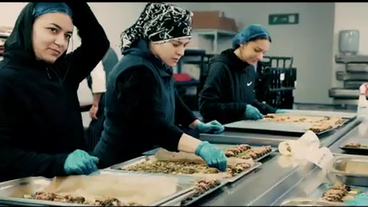 The Levy culinary team preparing food during live service