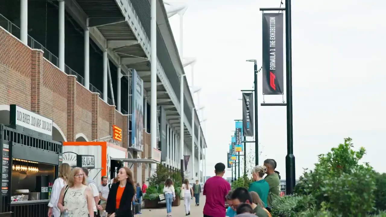 Visitors walking outside ExCeL London