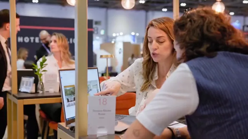 An exhibitor receiving support at a show stand