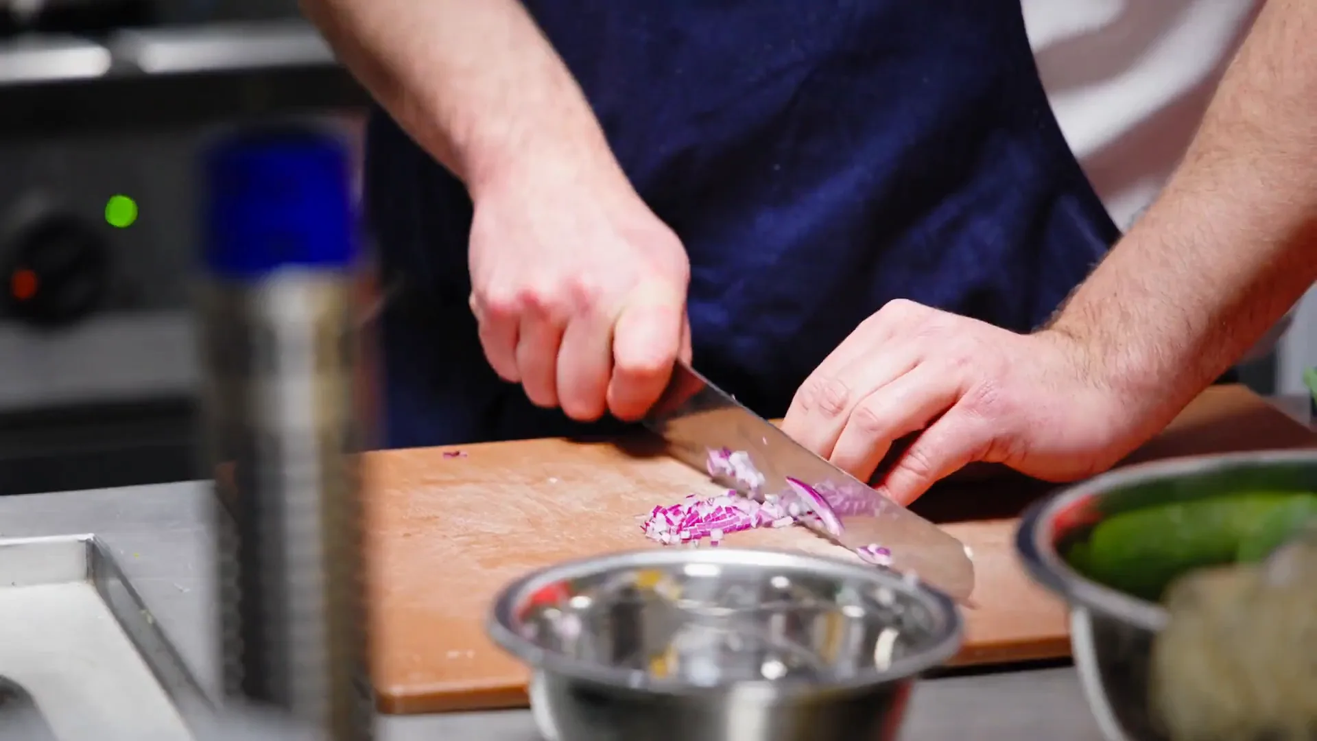 A chef preparing ingredients during the competition