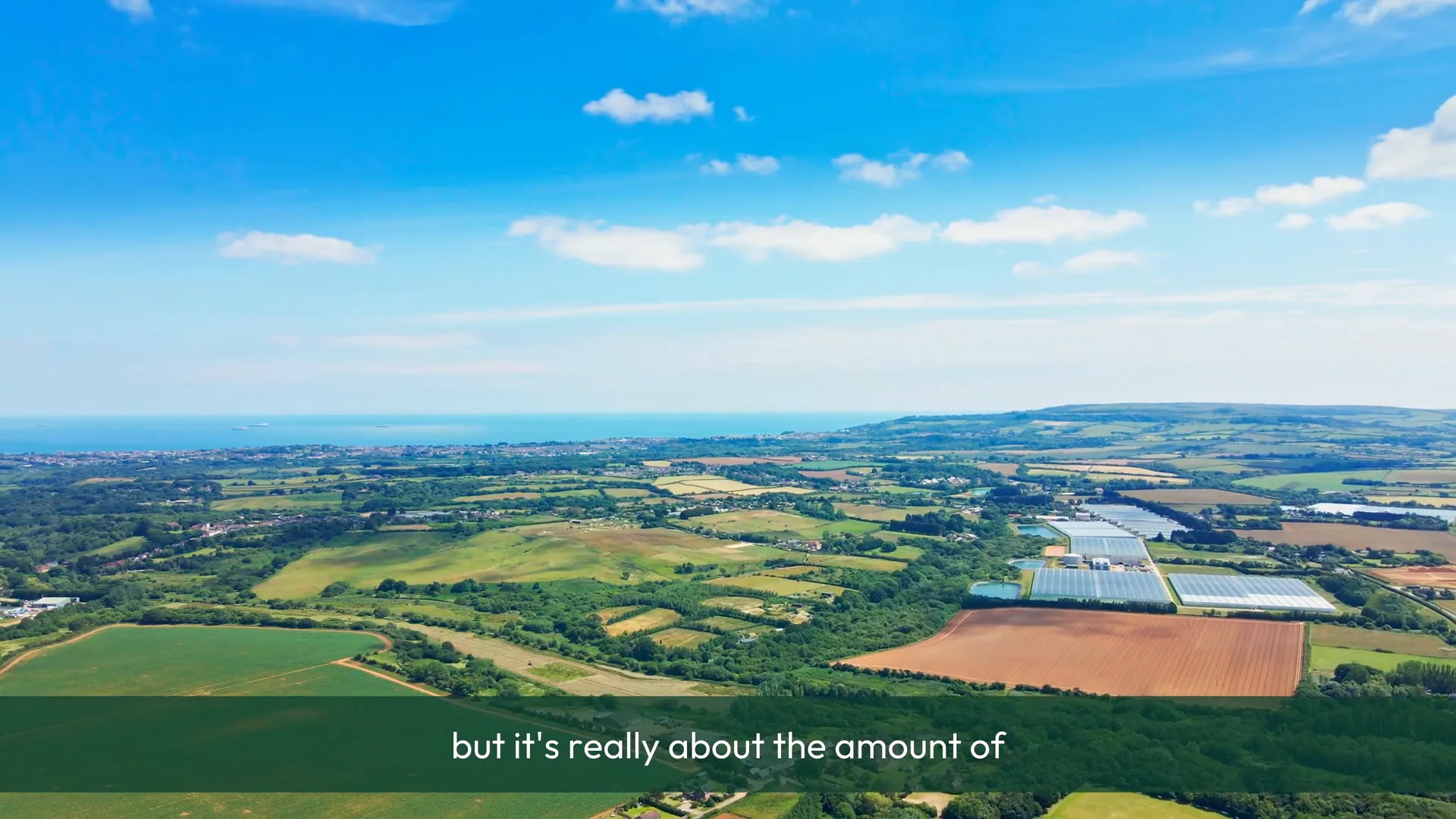 Aerial view across the Isle of Wight and its glasshouses