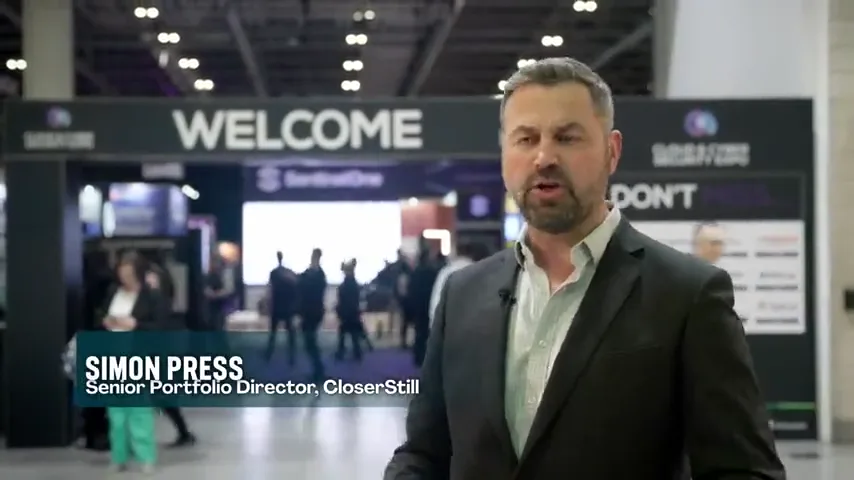 A contributor speaking on the SentinelOne event floor