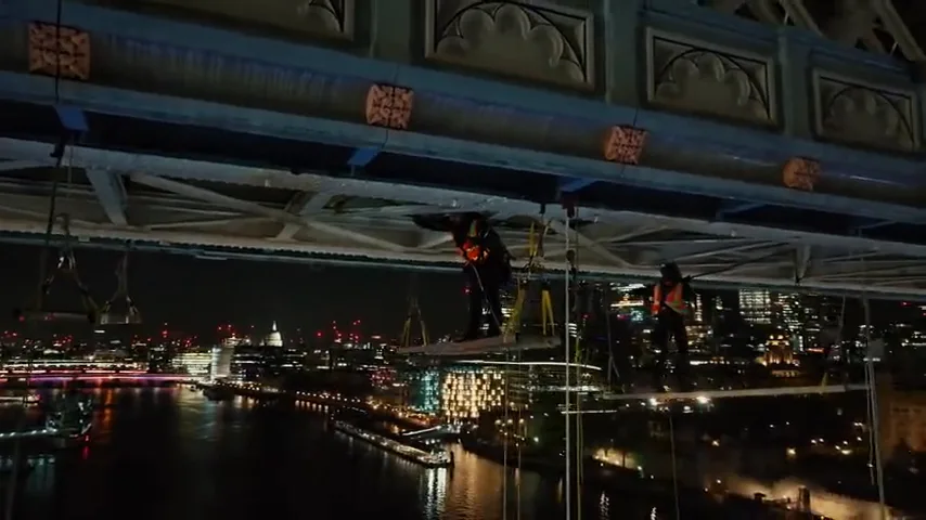 Tower Bridge structure above the River Thames at night