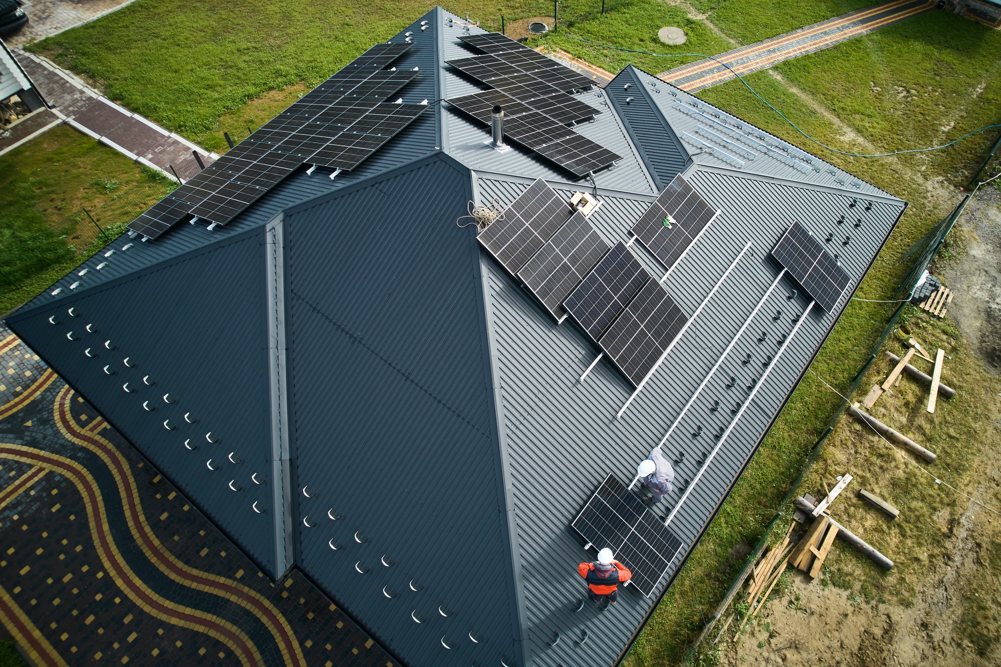 aerial view of house with solar roof